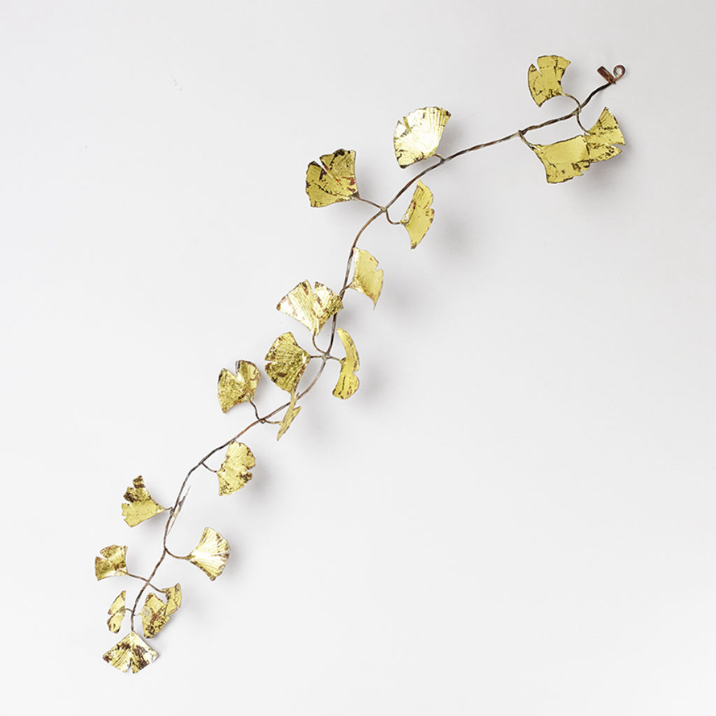 '21. Förgylld ginokvist', ett konstverk av Charlotte Melander